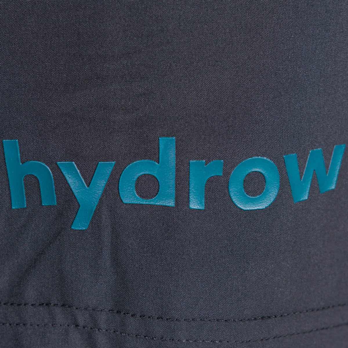 hydrow logo zoomed in on black compression short