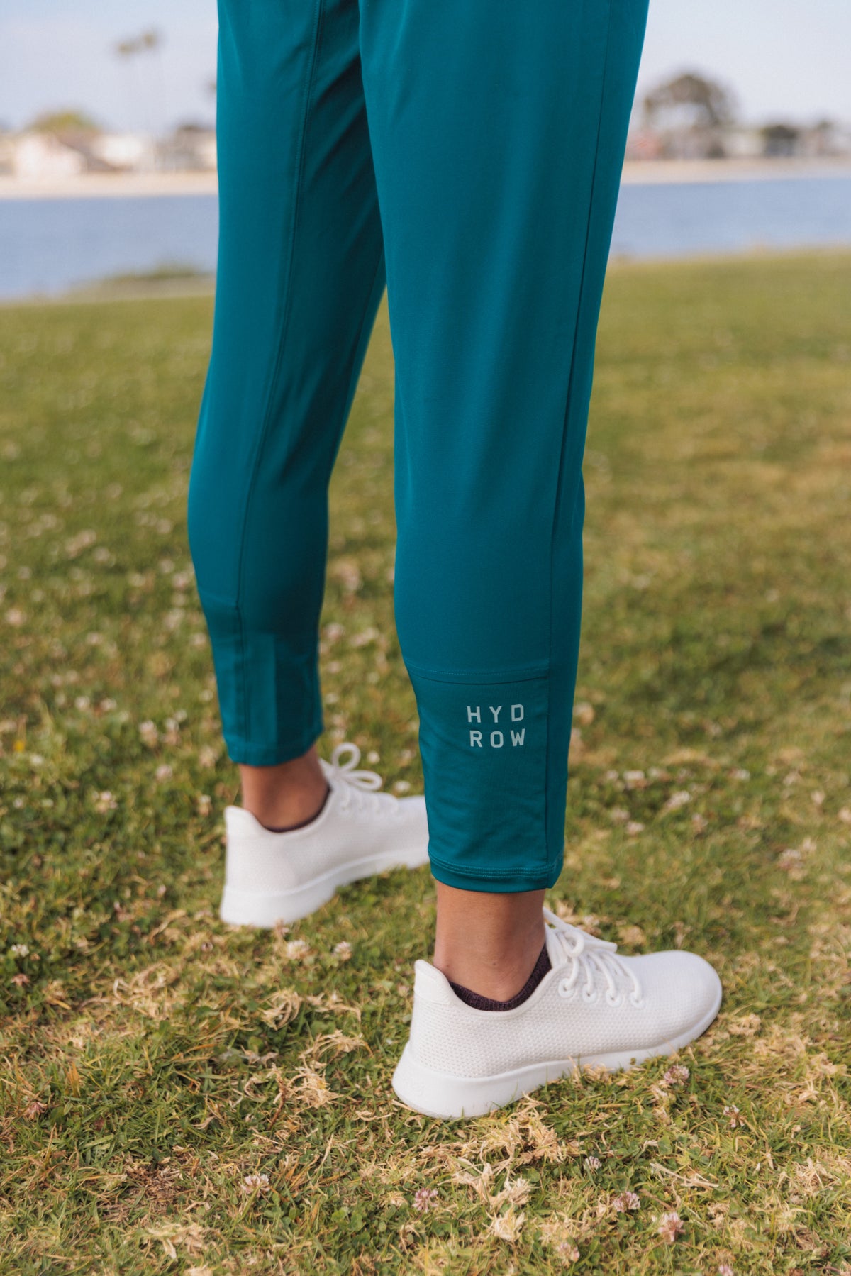 closeup of calf of unisex rowing pant with &quot;HYDROW&quot; text on calf