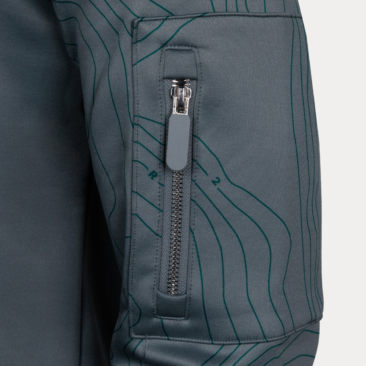 zip pocket on left sleeve of 1/4 zip pullover