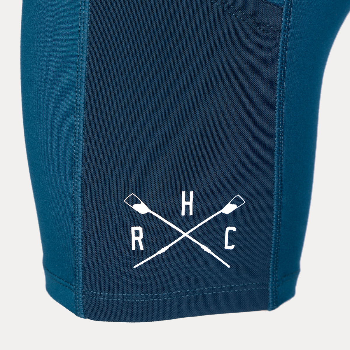 detail photo of rhc crossed oar logo on left leg mesh pocket. 