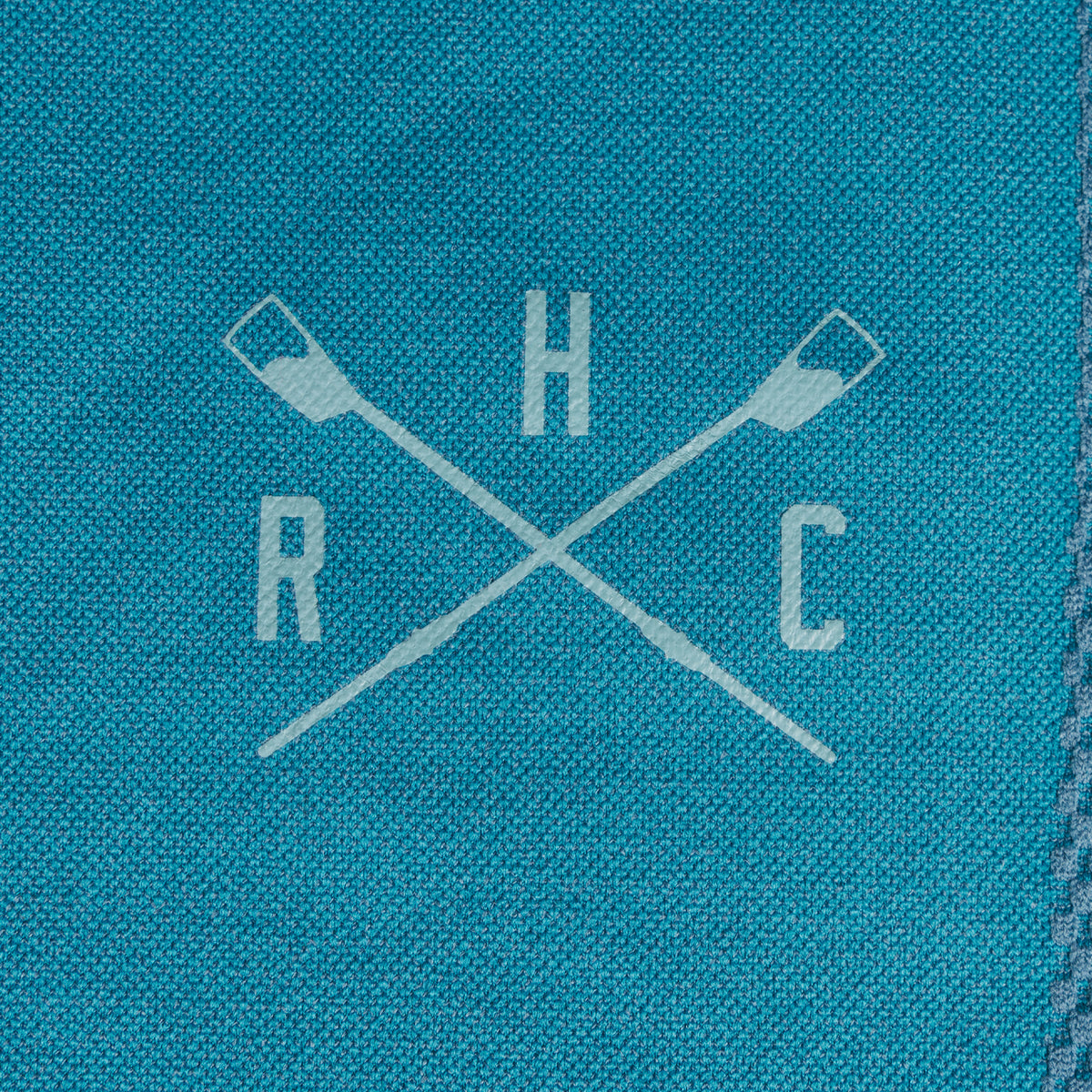 closeup of crossed oars logo on flex seamless leggings
